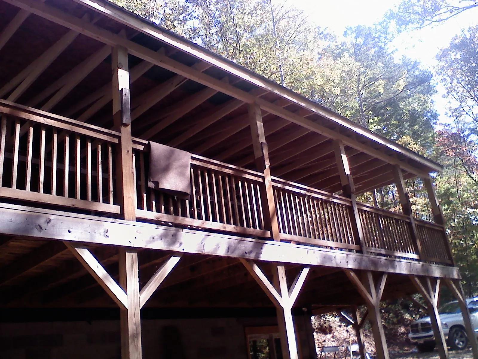 Timber framing under a new elevated porch and deck — Roof Leak Repair in Underhill by Roofing Brothers